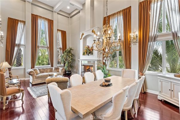 Chandelier, Dining room, Fireplace, Interior, Living room, Recessed Lighting, Wood Texture Flooring