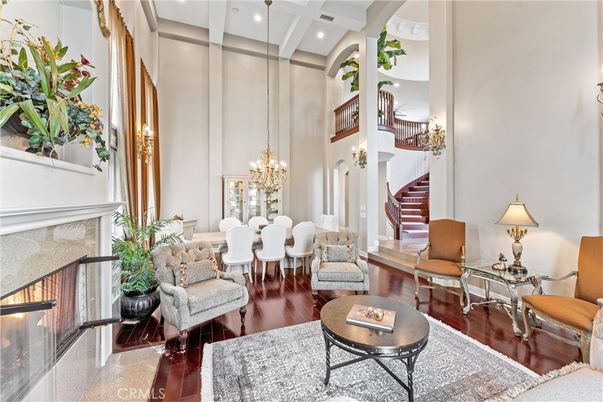 Chandelier, Dining room, Fireplace, Interior, Living room, Recessed Lighting, Wood Texture Flooring