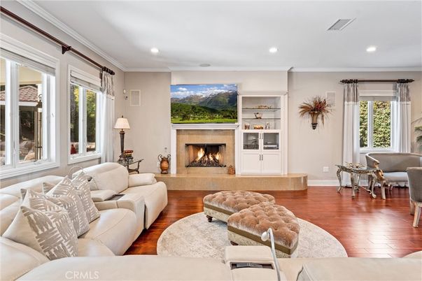 Dining room, Fireplace, Interior, Living room, Recessed Lighting, Wood Texture Flooring