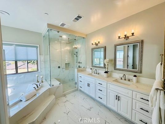 Bathroom, Dual Sink Vanities, Glass Shower, Interior, Marble, Marble Walls, Recessed Lighting