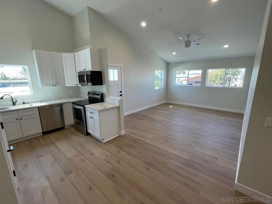 Interior, Kitchen, Recessed Lighting, Stainless Steel Appliances, Wood Texture Flooring