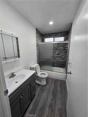 Bathroom, Dual Sink Vanities, Interior, Recessed Lighting, Wood Texture Flooring