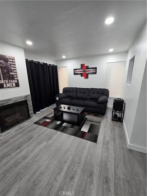 Fireplace, Interior, Living room, Recessed Lighting, Wood Texture Flooring