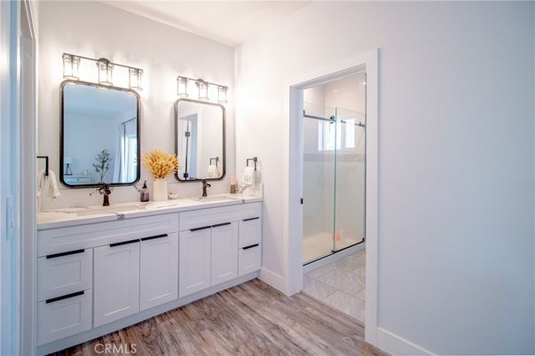 Bathroom, Dual Sink Vanities, Glass Shower, Interior, Wood Texture Flooring