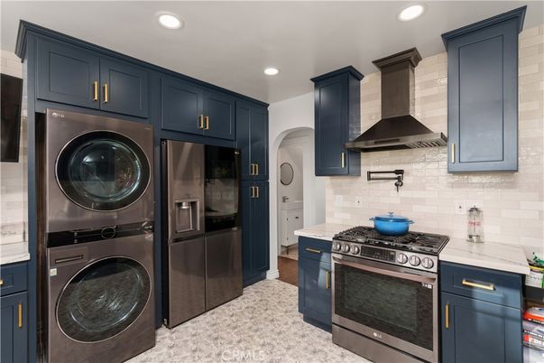 Interior, Kitchen, Recessed Lighting, Stainless Steel Appliances, Washer, Wood Texture Flooring