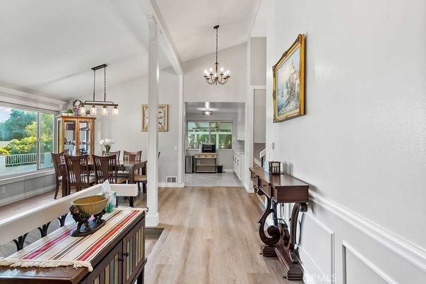 Chandelier, Dining room, Fireplace, Interior, Pendant Lights, Wood Texture Flooring