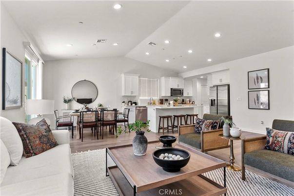 Dining room, Interior, Kitchen, Living room, Recessed Lighting, Stainless Steel Appliances, Wood Texture Flooring