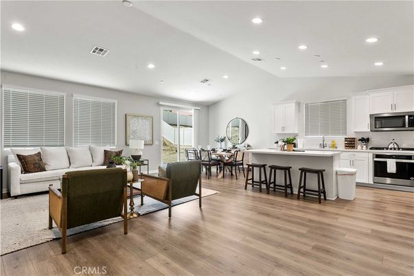 Dining room, Interior, Kitchen, Living room, Recessed Lighting, Stainless Steel Appliances, Wood Texture Flooring