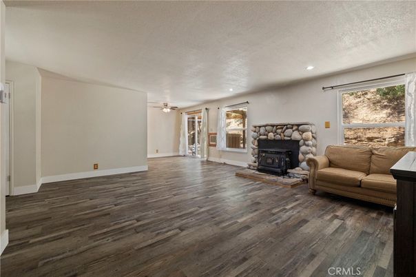 Empty room, Fireplace, Interior, Recessed Lighting, Wood Texture Flooring