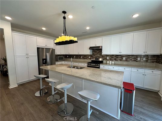 Chandelier, Interior, Kitchen, Recessed Lighting, Stainless Steel Appliances, Wood Texture Flooring