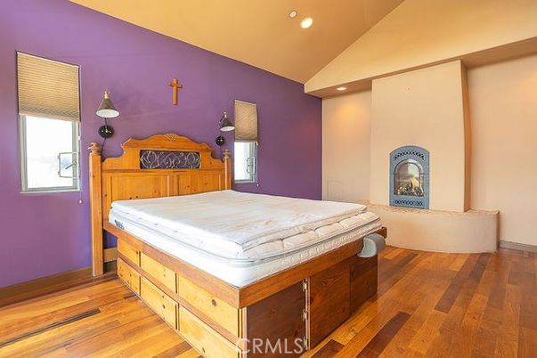 Bedroom, Fireplace, Interior, Recessed Lighting, Wood Texture Flooring