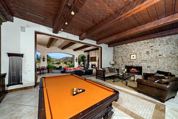 Billiard Table, Fireplace, Game Room, Interior, Living room, Recessed Lighting, Stone Walls, Wooden Beams, Wooden Ceilings