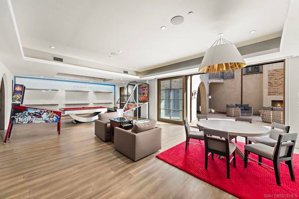 Dining room, Fireplace, Interior, Living room, Recessed Lighting, Wood Texture Flooring
