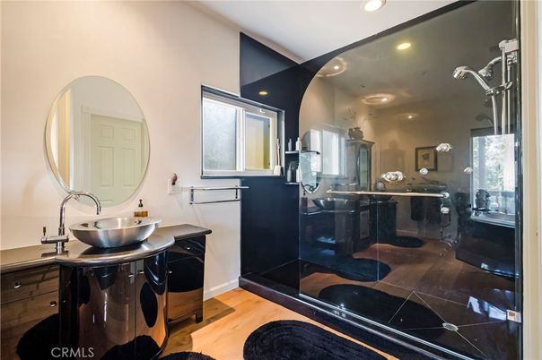 Bathroom, Dual Sink Vanities, Interior, Recessed Lighting, Wood Texture Flooring