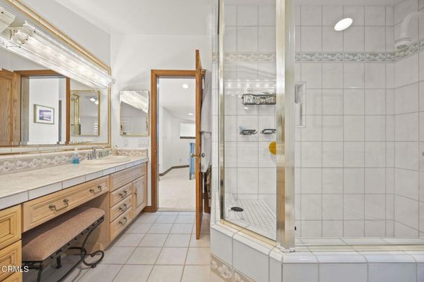 Bathroom, Dual Sink Vanities, Glass Shower, Interior, Recessed Lighting, Tile Countertops