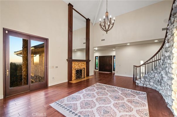 Chandelier, Fireplace, Interior, Recessed Lighting, Wood Texture Flooring
