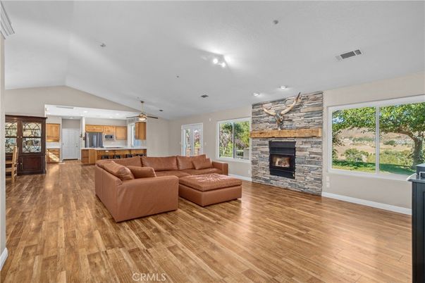 Fireplace, Interior, Kitchen, Living room, Pendant Lights, Recessed Lighting, Stone Walls, Wood Texture Flooring