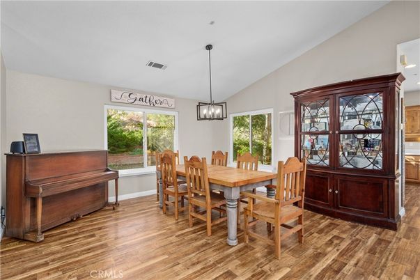 Dining room, Interior, Pendant Lights, Piano, Wood Texture Flooring