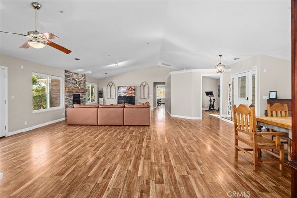 Dining room, Fireplace, Interior, Living room, Pendant Lights, Recessed Lighting, Wood Texture Flooring