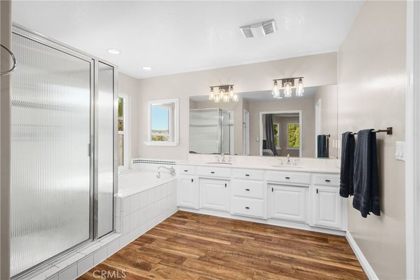Bathroom, Dual Sink Vanities, Interior, Recessed Lighting, Wood Texture Flooring