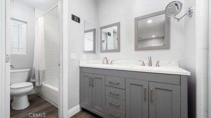 Bathroom, Dual Sink Vanities, Interior, Recessed Lighting, Wood Texture Flooring