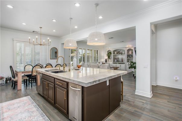 Dining room, Interior, Kitchen, Living room, Pendant Lights, Recessed Lighting, Stainless Steel Appliances, Wood Texture Flooring