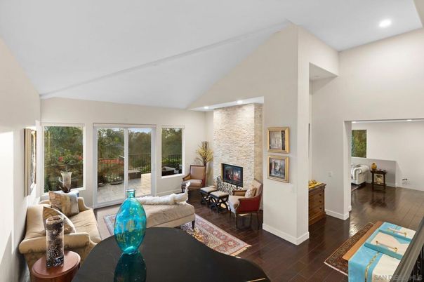 Fireplace, Interior, Living room, Recessed Lighting, Stone Walls, Wood Texture Flooring