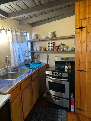 Interior, Kitchen, Stainless Steel Appliances, Tile Countertops, Wood Texture Flooring