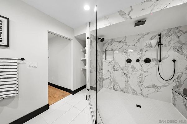 Bathroom, Glass Shower, Interior, Marble Walls, Recessed Lighting, Wood Texture Flooring