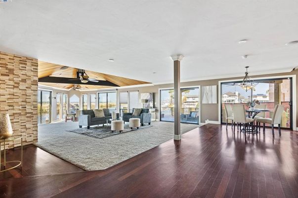 Chandelier, Dining room, Interior, Living room, Recessed Lighting, Stone Walls, Wood Texture Flooring