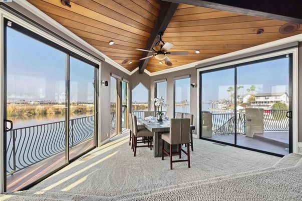 Dining room, Interior, Recessed Lighting, Sun Room, Water, Wooden Ceilings