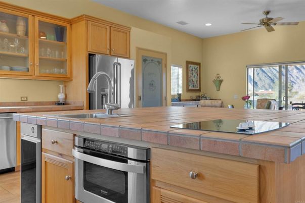Interior, Kitchen, Recessed Lighting, Stainless Steel Appliances, Tile Countertops