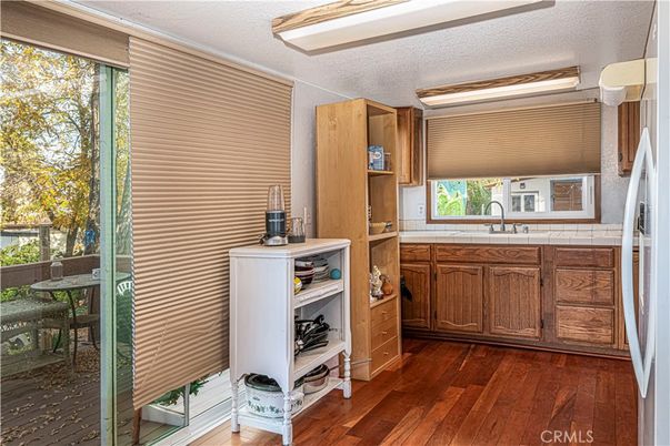 Interior, Kitchen, Tile Countertops, Wood Texture Flooring