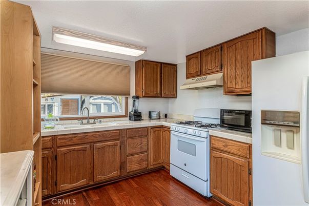Interior, Kitchen, Tile Countertops, Wood Texture Flooring