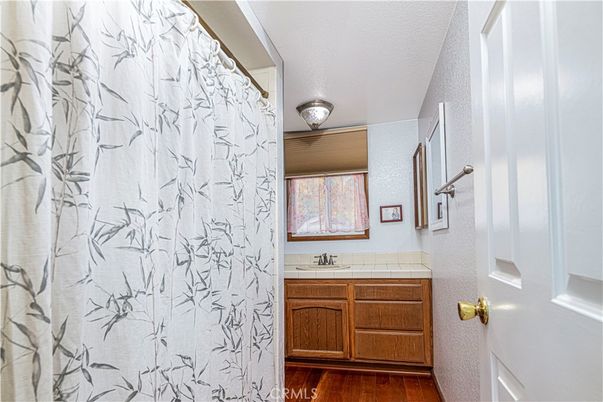 Bathroom, Interior, Tile Countertops, Wood Texture Flooring