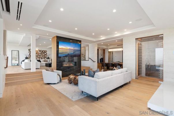 Dining room, Fireplace, Interior, Living room, Recessed Lighting, Wood Texture Flooring