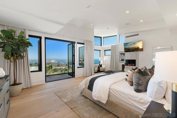 Bedroom, Fireplace, Interior, Recessed Lighting, Water, Wood Texture Flooring