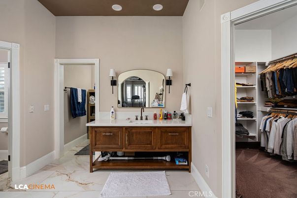 Bathroom, Dual Sink Vanities, Interior, Marble, Recessed Lighting, Walk-in Closets