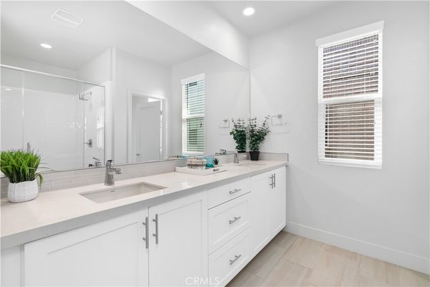 Bathroom, Dual Sink Vanities, Glass Shower, Interior, Recessed Lighting, Wood Texture Flooring
