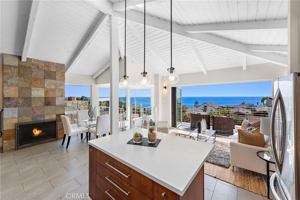 Dining room, Fireplace, Interior, Kitchen, Living room, Pendant Lights, Stone Walls, Water