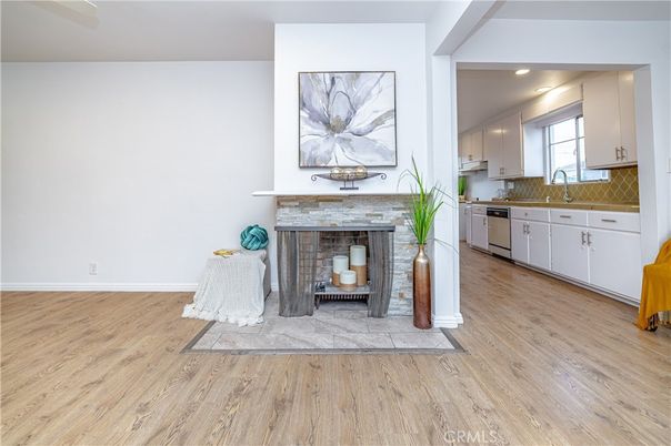 Fireplace, Interior, Kitchen, Recessed Lighting, Wood Texture Flooring
