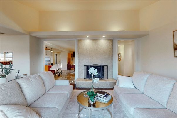 Dining room, Fireplace, Interior, Living room, Pendant Lights, Recessed Lighting, Wood Texture Flooring