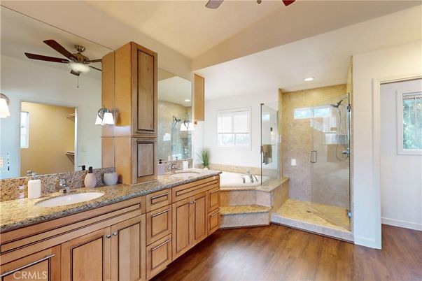 Bathroom, Dual Sink Vanities, Glass Shower, Interior, Recessed Lighting, Wood Texture Flooring