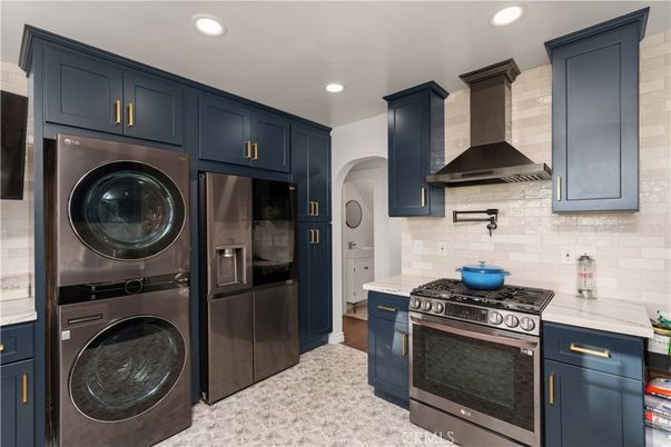 Interior, Kitchen, Recessed Lighting, Stainless Steel Appliances, Washer, Wood Texture Flooring