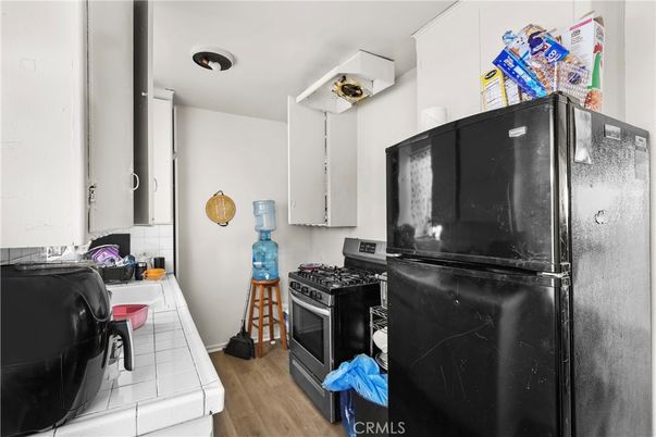 Interior, Kitchen, Tile Countertops, Wood Texture Flooring