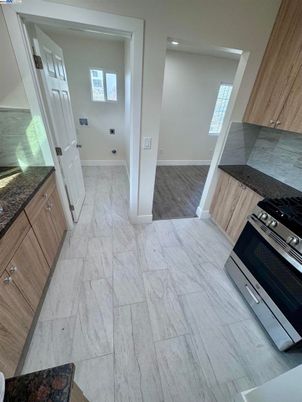 Interior, Kitchen, Marble, Recessed Lighting, Stainless Steel Appliances, Wood Texture Flooring