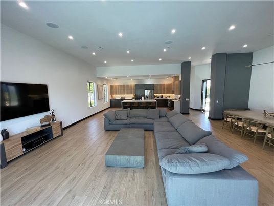 Dining room, Interior, Kitchen, Living room, Recessed Lighting, Stainless Steel Appliances, Wood Texture Flooring