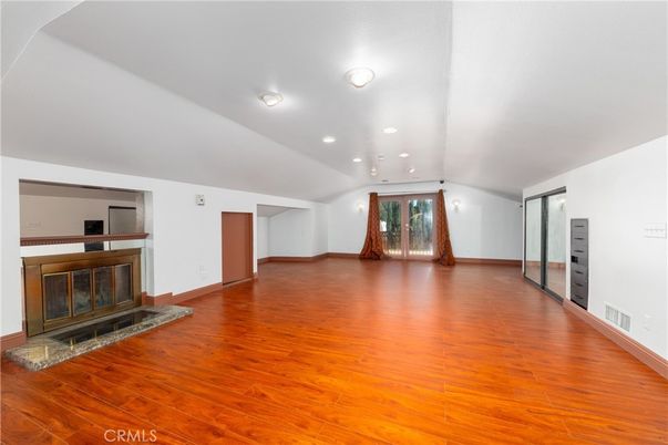Empty room, Fireplace, Interior, Recessed Lighting, Wood Texture Flooring
