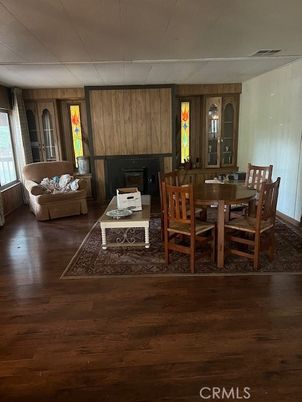 Dining room, Fireplace, Interior, Living room, Wood Texture Flooring