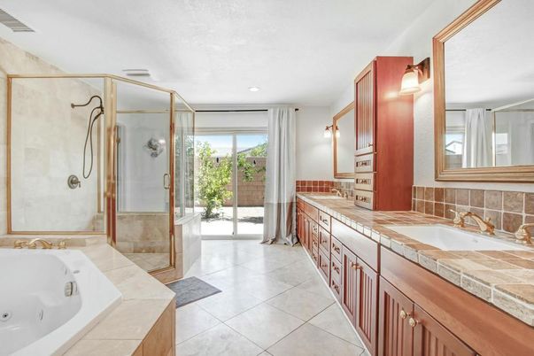 Bathroom, Dual Sink Vanities, Glass Shower, Interior, Recessed Lighting, Tile Countertops